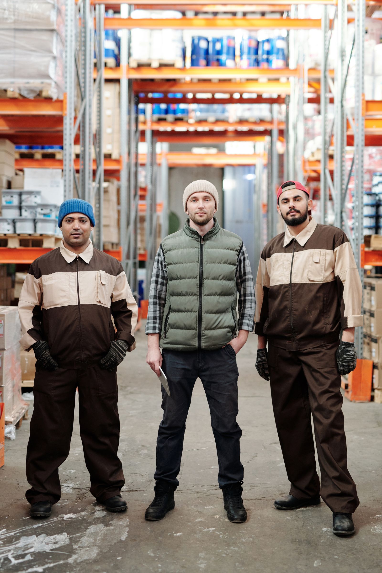 Quality Pallets Inc. warehouse team in an organized storage area